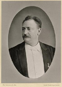 Oval b&w head and shoulders photographic portrait of Johannes Messchaert, turning to his right